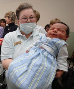 Baba pólyázása, baba bebugyolálása, pólya, bugyolálás